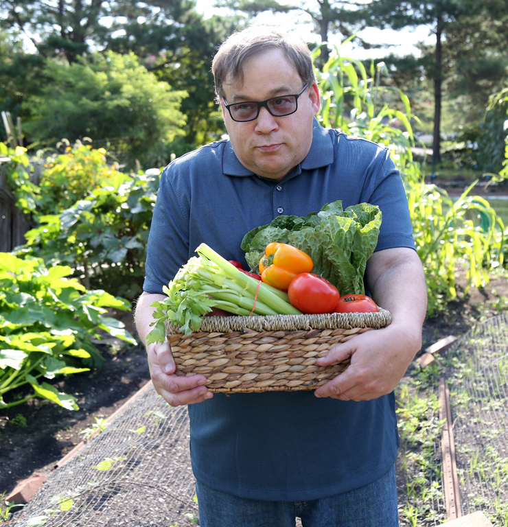 Finding a career that is rewarding, man working in a nursery garden