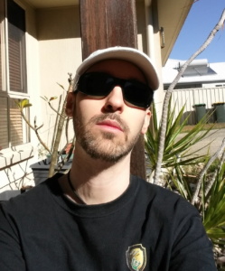 Andrew talks about having to change job direction to find work, photo of him looking at the camera
