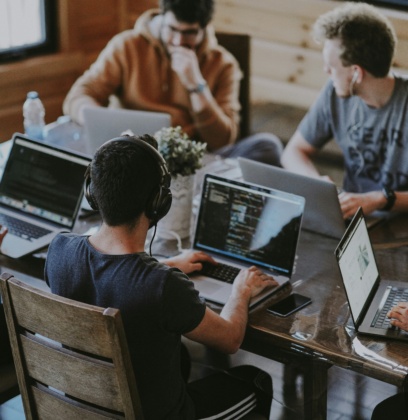 Man Working With Inclusive Employment Australia Provider In Modern Office Setting