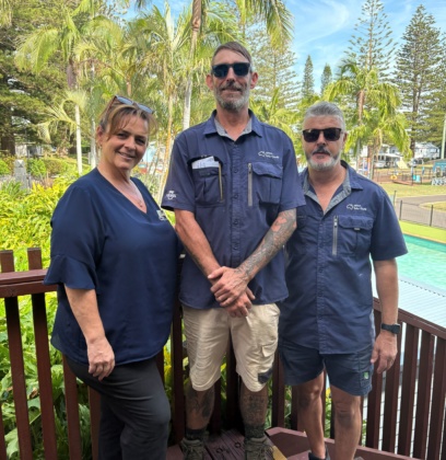 Jamie with his employers at NRMA Breakwall Holiday park